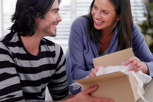 couple unpacking gift