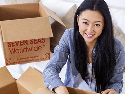 woman packing boxes